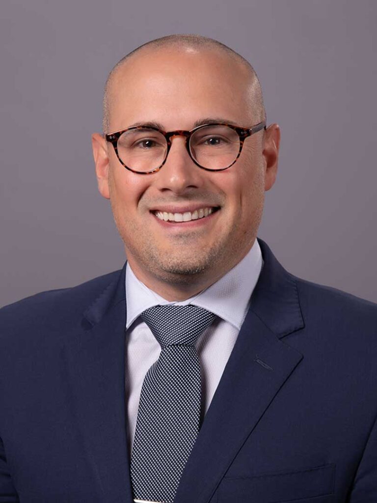 A professional headshot photograph of Andrew-Paul Deeb, MD Msc